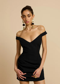 Arcina Ori Avery black mini dress – off-shoulder little black dress with elegant neckline and flattering true-to-size fit. Hire from Tenn Designer Hire.