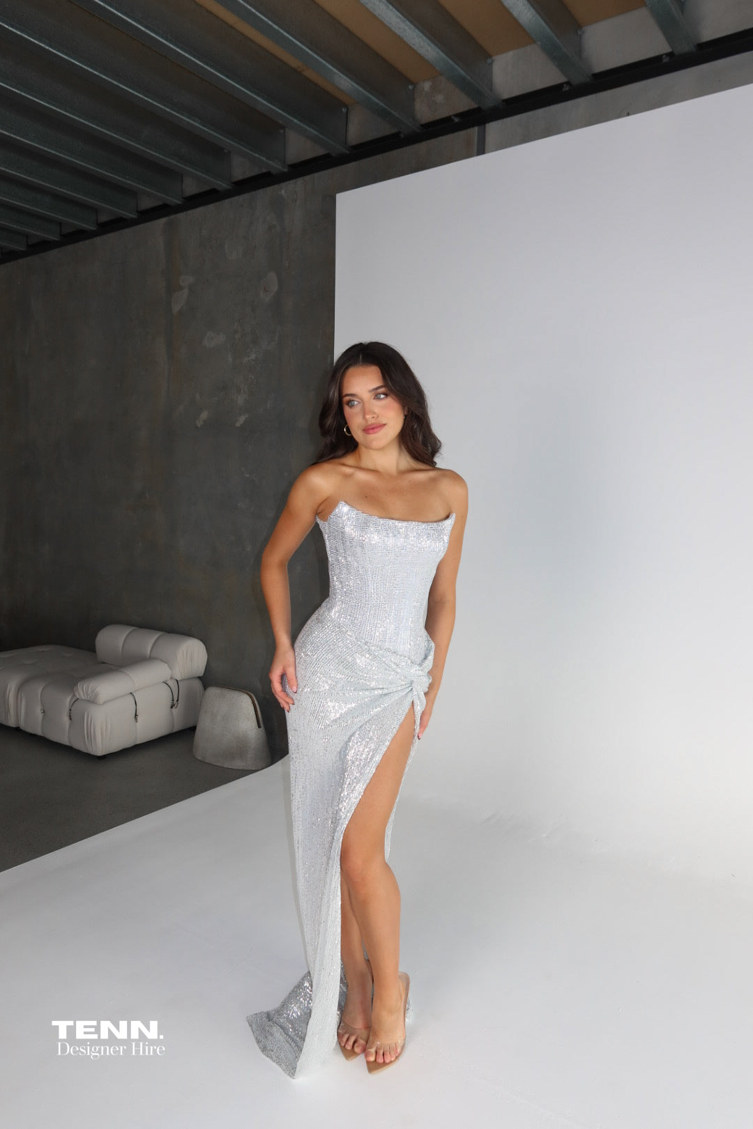 Chanel Gown by Lia Stublla Hire in Diamond – Two-Piece with Crescent Neckline, Fully Boned Corset Bodice, Lace-Up Back, Twist-Detail Skirt, and Thigh-High Split.