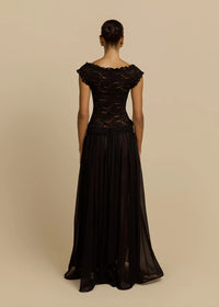 Arcina Ori Arabella Dress available for hire at TENN Designer Hire — unique off-shoulder gown with lace bodice and flowing skirt, perfect for formal events and special occasions, styled with gold accessories.