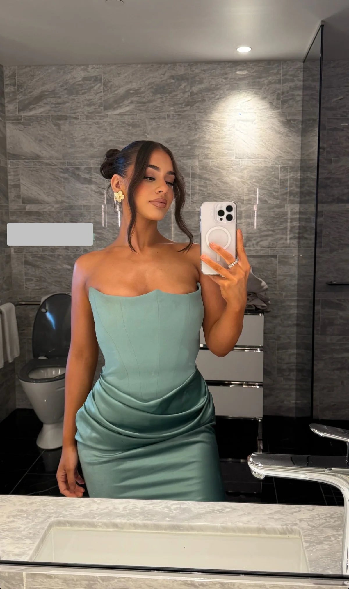 House of CB Persephone strapless corset gown in jade green with pointed neckline and pleated hip detailing — elegant curve-enhancing dress available at Tenn Designer Hire.