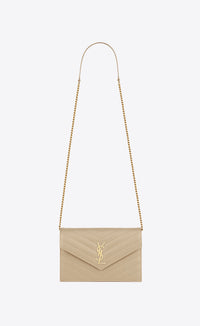 YSL nude clutch bag hire