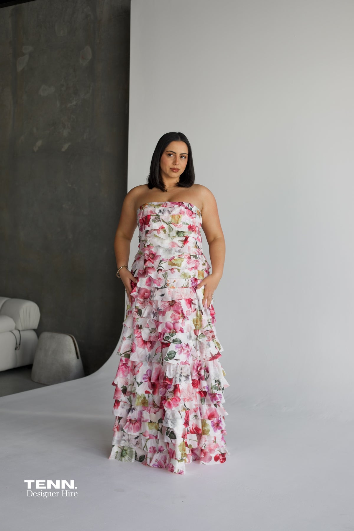 Aje Fleur Pleated Gown Hire from Tenn – Strapless Pink Floral Dress with Ruffles and Flowing A-Line Skirt