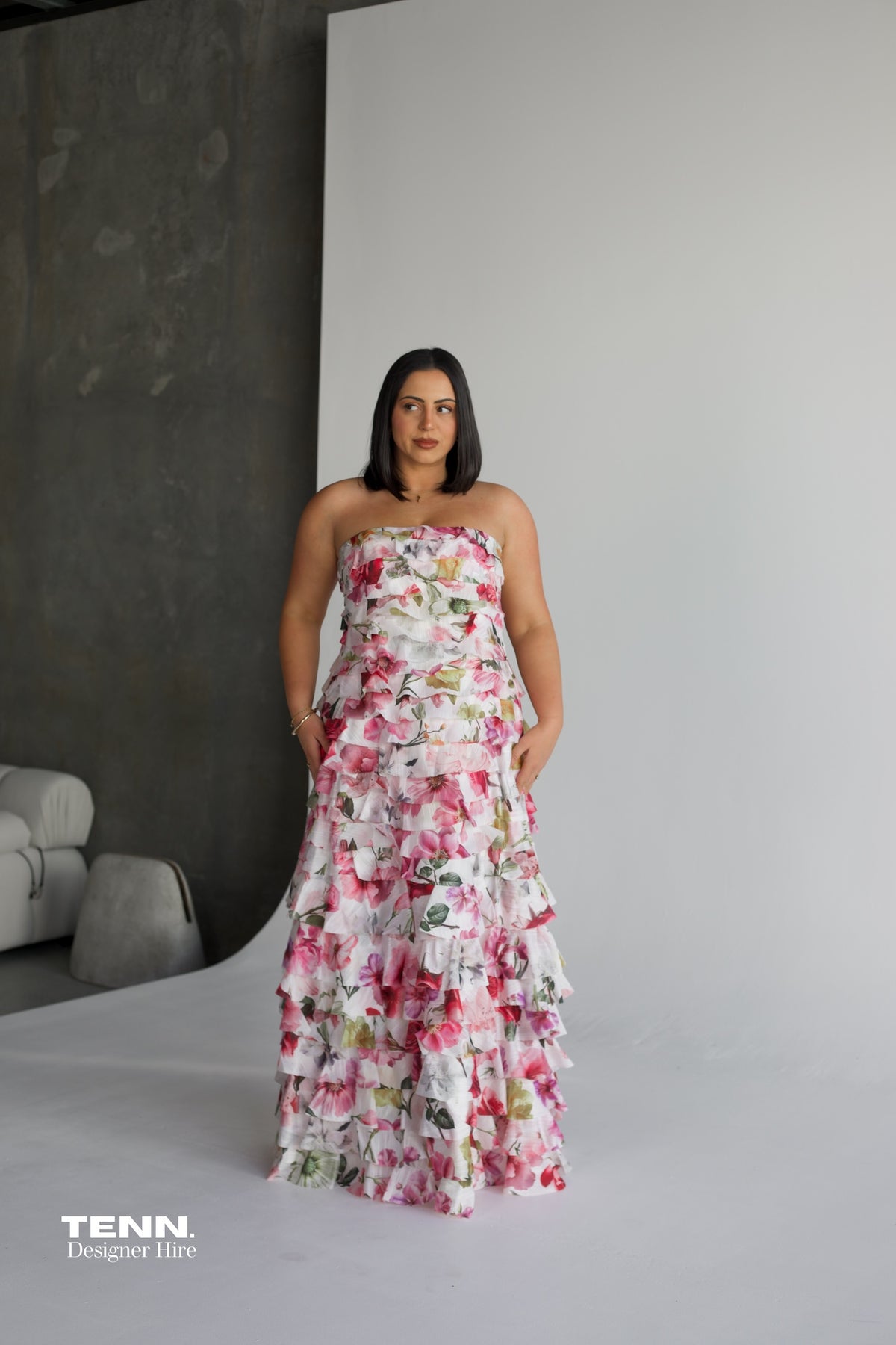 Aje Fleur Pleated Gown Hire from Tenn – Strapless Pink Floral Dress with Ruffles and Flowing A-Line Skirt
