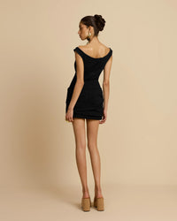 Arcina Ori Avery black mini dress – off-shoulder little black dress with elegant neckline and flattering true-to-size fit. Hire from Tenn Designer Hire.