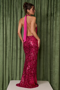 Fait Par Foutch Liana Dress Hire – magenta sequin gown with V-neckline, halter ties, and low back.