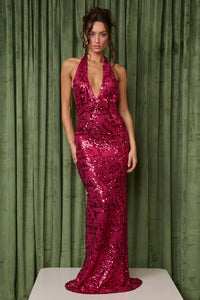Fait Par Foutch Liana Dress Hire – magenta sequin gown with V-neckline, halter ties, and low back.