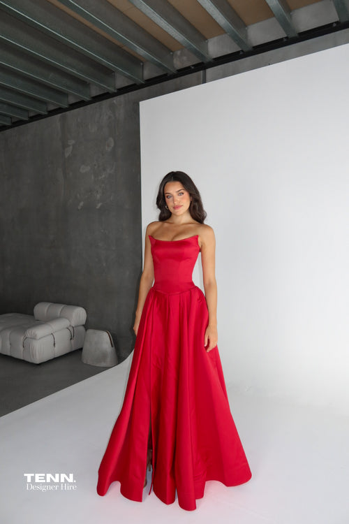 Gabriella Gown by Lia Stublla x TENN Hire in Red – Original Design with Structured Bodice, Drop Waist, Voluminous Skirt, and Leg Split.