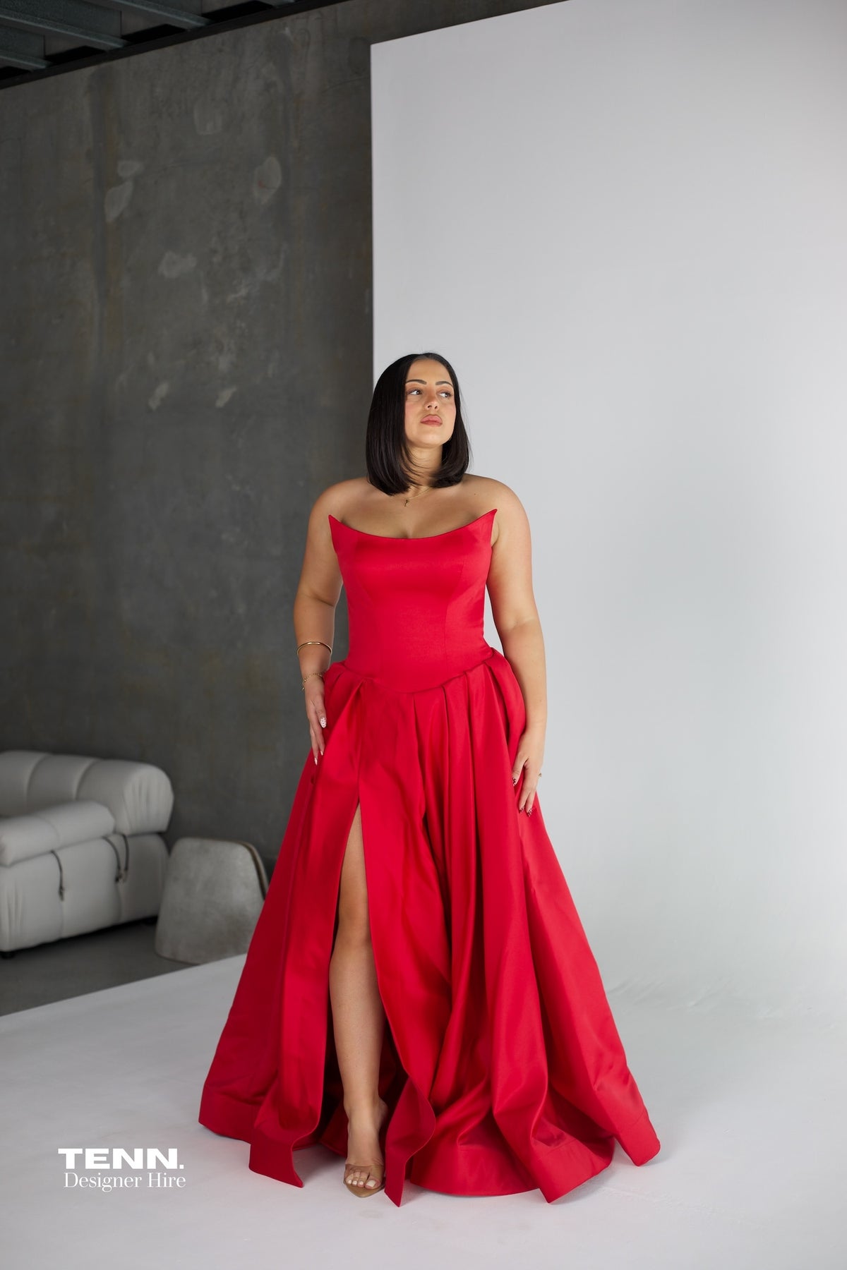 Gabriella Gown by Lia Stublla x TENN Hire in Red – Original Design with Structured Bodice, Drop Waist, Voluminous Skirt, and Leg Split.