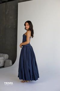 Aje Violette Bubble Hem Maxi Dress in slate available for hire at TENN Designer Hire — two-piece formal gown featuring Sunbeam bustier and Violette bubble hem skirt, thigh-high slit, figure-hugging corset bodice, and elegant dropped waist.