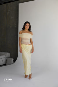 Benni Nico Maxi Dress available for hire at TENN Designer Hire — effortlessly chic summer dress with off-shoulder neckline and asymmetric skirt, perfect for long lunches, summer nights, and special occasions.