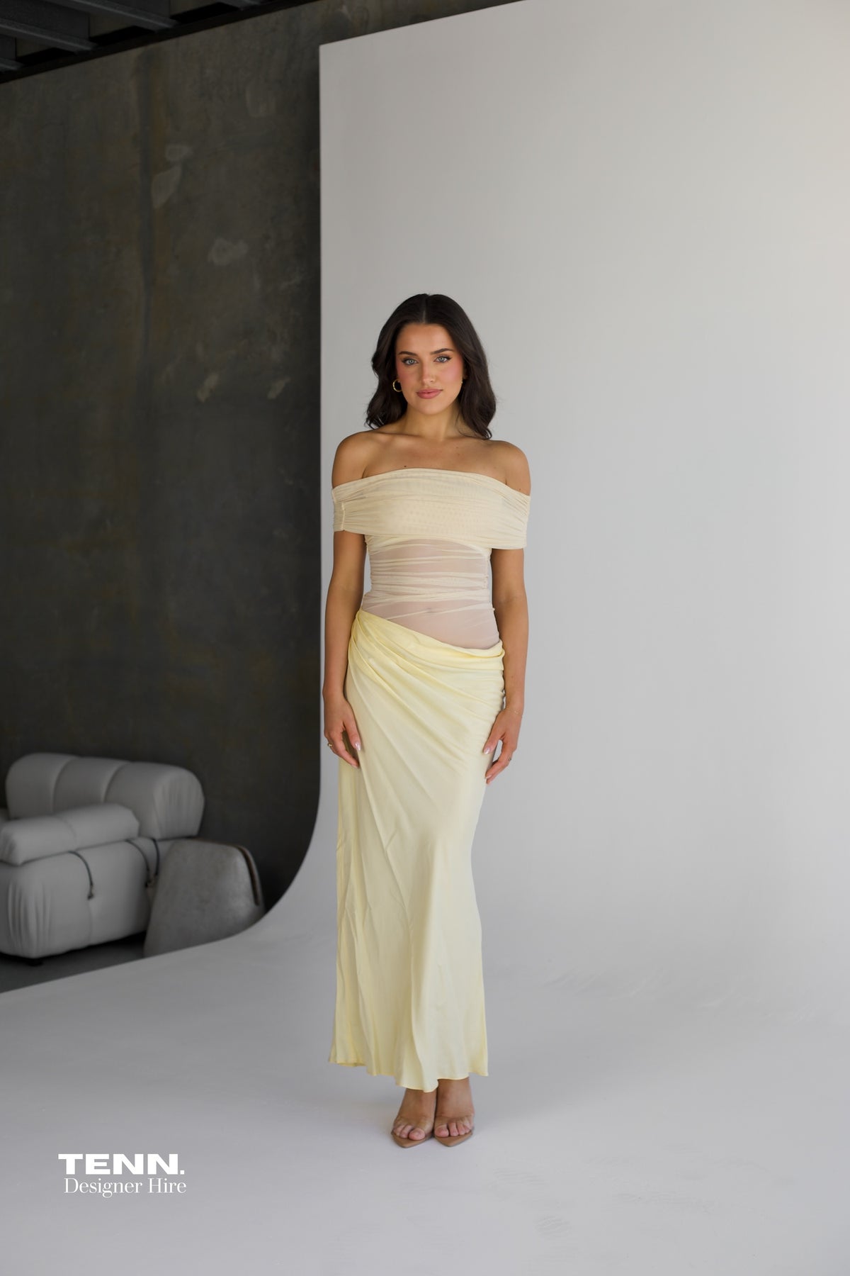 Benni Nico Maxi Dress available for hire at TENN Designer Hire — effortlessly chic summer dress with off-shoulder neckline and asymmetric skirt, perfect for long lunches, summer nights, and special occasions.