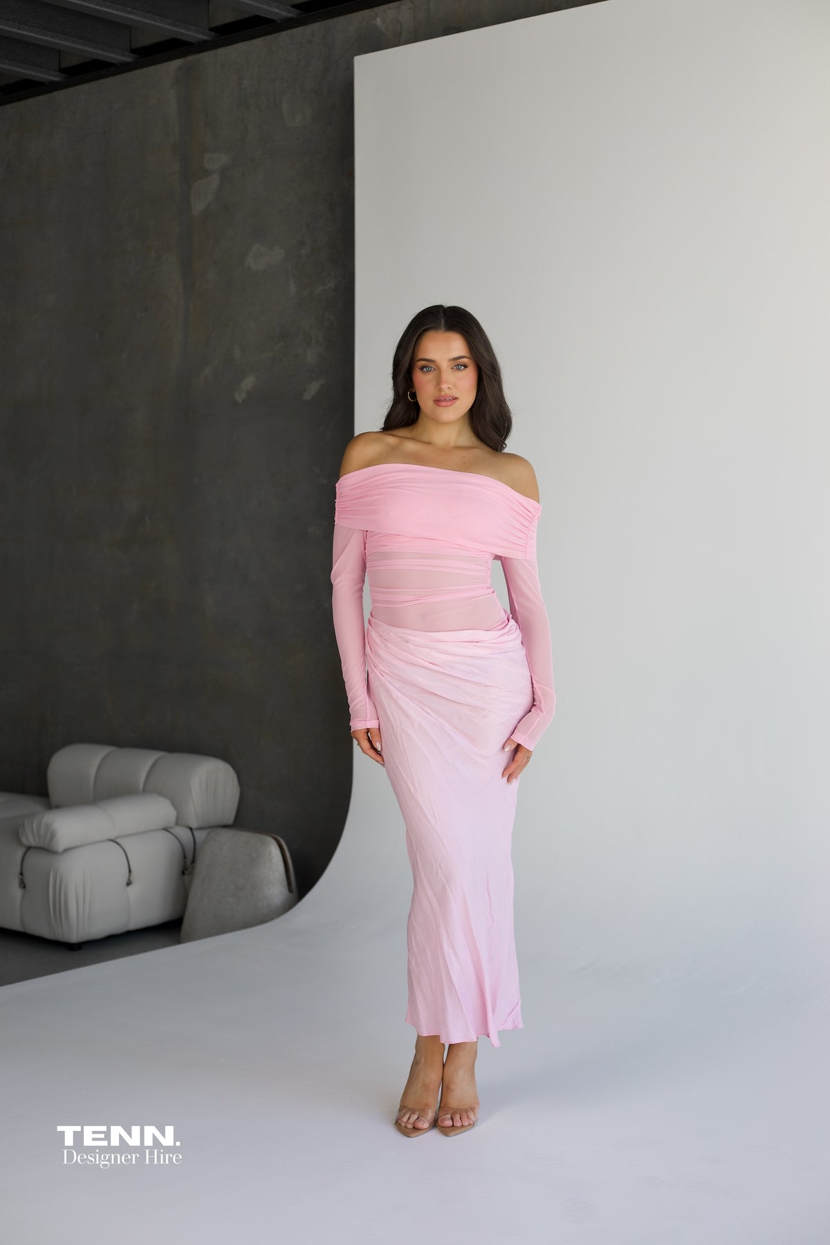 Benni Yasmin Off Shoulder Maxi Dress available for hire at TENN Designer Hire — effortlessly chic summer dress with off-shoulder neckline and asymmetric skirt, perfect for long lunches, summer nights, and special occasions.