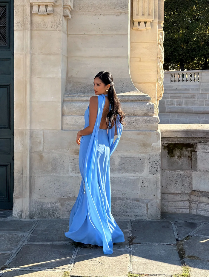 Calia Collection Antonia Dress in sky blue available for hire at TENN Designer Hire — sweet and flirty dress with plunging neckline, neck tie detailing, and ruching throughout, perfect for day-to-night occasions, dinner dates, or formal events.