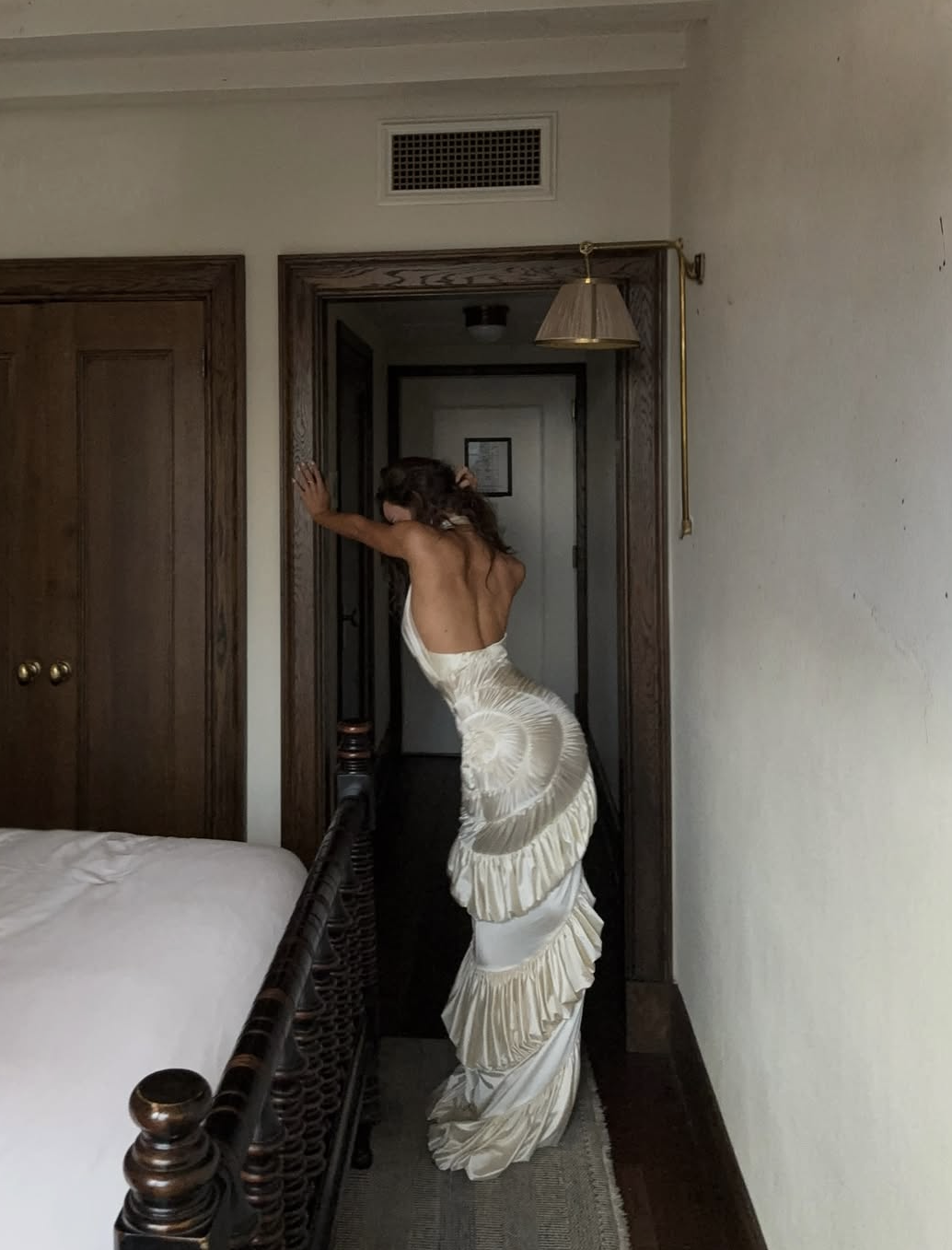 Datt Official Ammonite Ivory Dress available for hire at TENN Designer Hire — handcrafted gown with unique spiral pattern, versatile halter neckline, pinched detailing, as seen on Isabelle Mathers and Sopha Dopha.