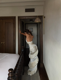 Datt Official Ammonite Ivory Dress available for hire at TENN Designer Hire — handcrafted gown with unique spiral pattern, versatile halter neckline, pinched detailing, as seen on Isabelle Mathers and Sopha Dopha.