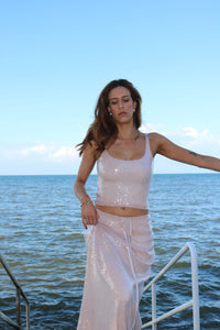 Lane & Sass Aria Cami and Aria Skirt in blush available for hire at TENN Designer Hire — elegant two-piece set featuring soft scoop neckline with subtle shimmer, floaty feminine skirt, elasticated waist, and versatile day-to-night styling options.