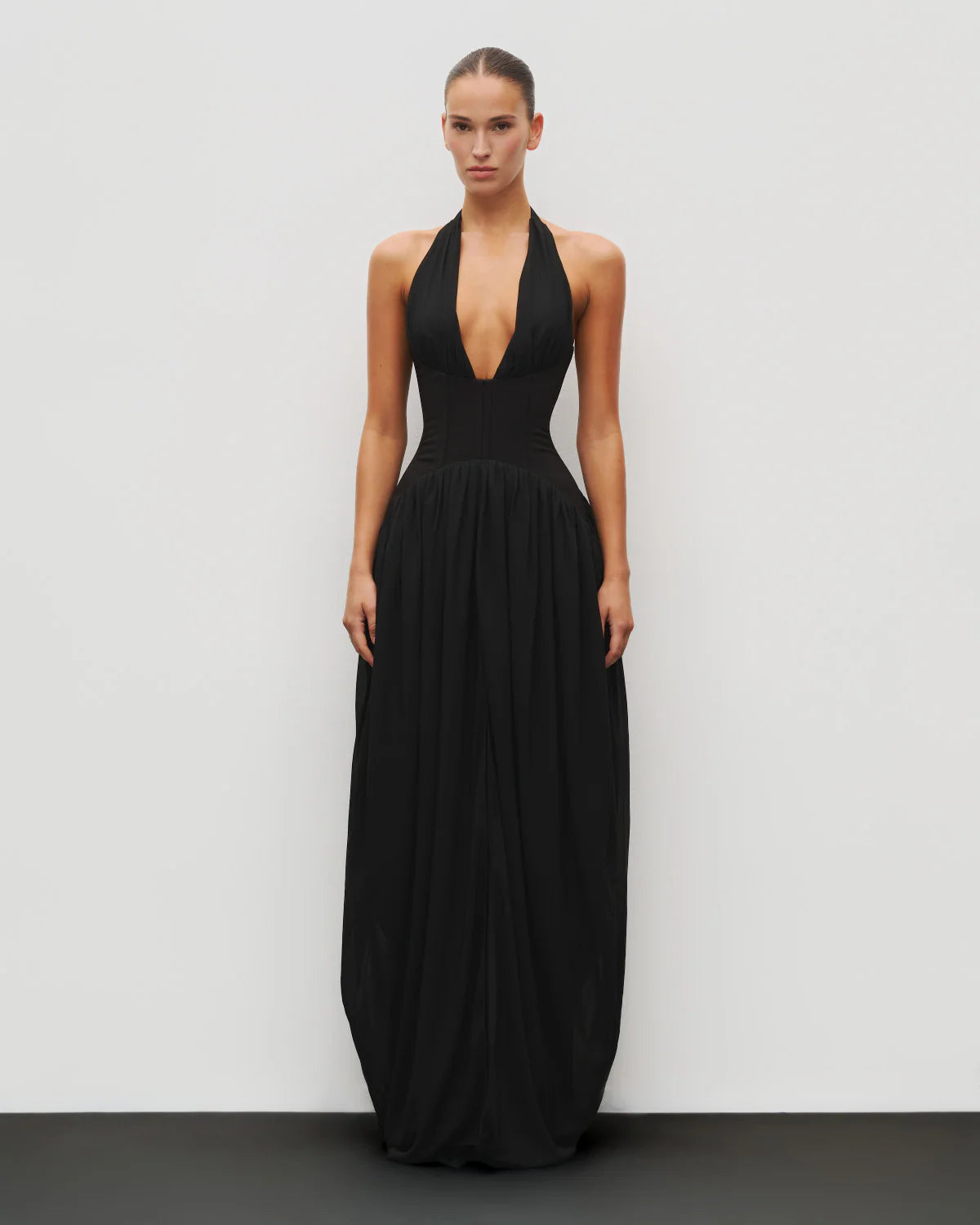 Heiress Beverly Hills Halter Corset Gown featuring a halter neckline, cinched corseted waist and flowing chiffon skirt, elegant formal dress available for hire from TENN Designer Hire.